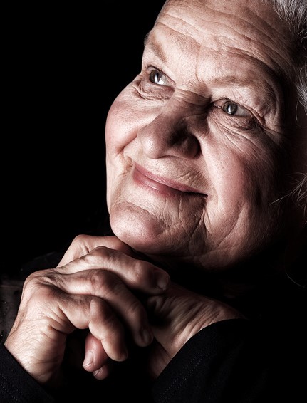 Caregiver comforting an individual experiencing memory loss